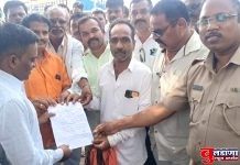 कोळी महादेव’ समाजाचे नळगंगा धरणात जलसमाधी आंदोलन ! तहसिलदार हेमंत पाटील यांच्या लेखी आश्वासनाने आंदोलन तुर्तास स्थगित!!